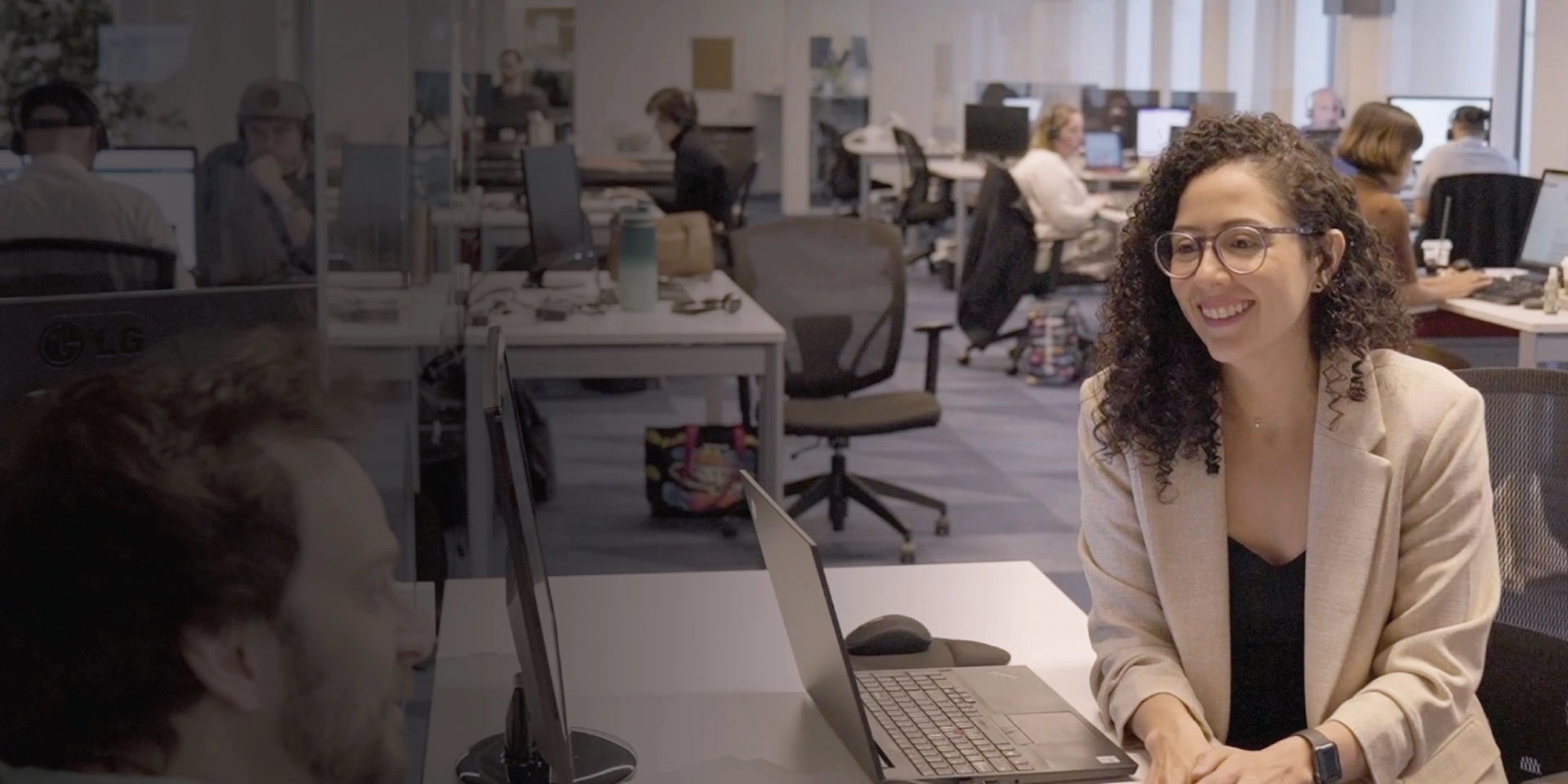 Sekure employees working at their desks