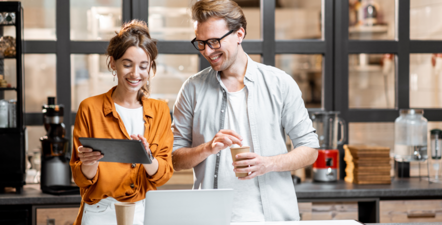 Business owners reviewing POS data