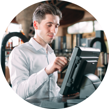 employee using a touch screen POS system