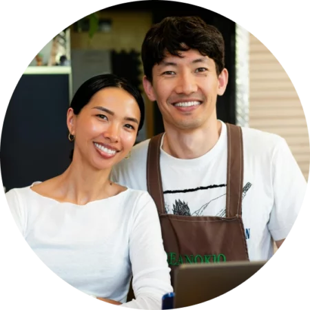 business partners smiling and posing for a photo